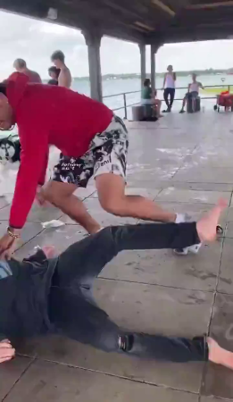 During The Fight, A Furious Dude Threw His Opponent Into The Ocean