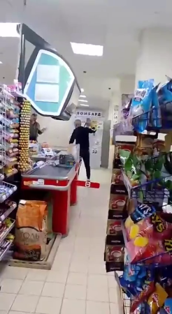 A Man Beats Up A Skinhead Who Attacked Store Customers With A Knife. Russia