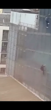 Guy climbs building and falls