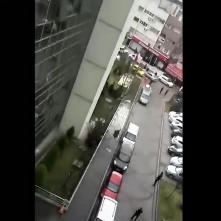 Man jumps off building