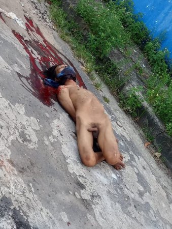 Naked Bound Bloke Found Stabbed to Death