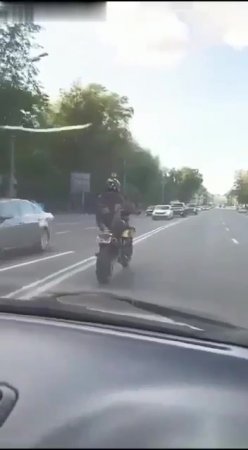 Motorcyclist Trying to Get Ahead of the Traffic!