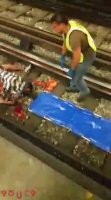 A Man Who Fell On The Subway Rails Is Collected In Pieces