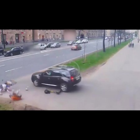 Russia. Two On A Scooter Vs Car