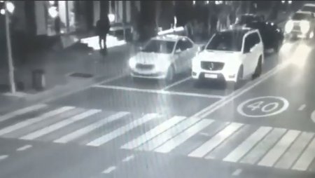 The Driver Of The Car Did Not See The Idiot Who Lay Down On The Road And Ran Over Him