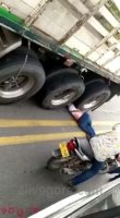Woman Under The Wheels Of A Truck