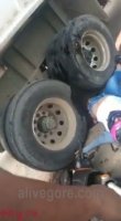 Motorcyclist's Legs Crushed By Truck Wheels