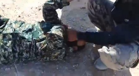 Soldiers Of An Unknown Country Cut The Throat Of The Enemy