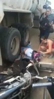 Woman Motorcyclist Crushed By Truck Wheels