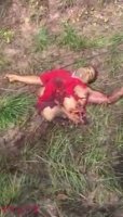 Body Parts Of A Motorcyclist Scattered In A Field After An Accident
