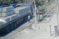 A Fallen Concrete Block Crushed A Man Passing By A Truck