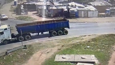 Dude Tried To Jump On A Truck But Was Crushed By 5 Pairs Of Wheels