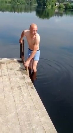 Raising A Drowned 6 Year Old From The Water. Russia