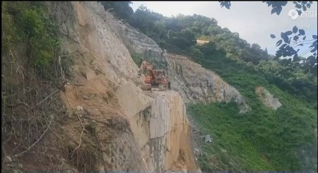 An Excavator Plummeted Off A Huge Cliff