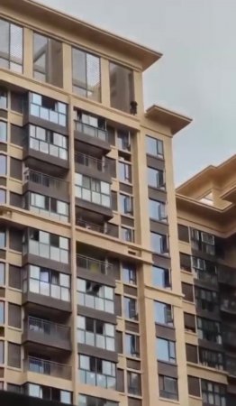 Another Idiot Jumped From A High-rise Building In China