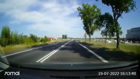 A Motorcyclist Was Thrown Under The Wheels Of An Oncoming Car. Poland