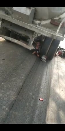 The man is already legless sitting under the truck