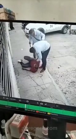 Two Men Beat The Dude With Their Feet, Hands And A Gun