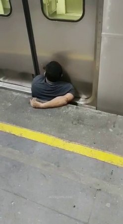 The Man Is Crushed Between The Platform And The Train