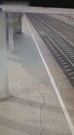 An Old Woman Lay Down On The Tracks In Front Of A Train