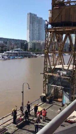 Dude Jumped Off A Harbor Crane Onto A Dock