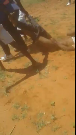African Thief Caught ,dragged And Beaten By Angry Mob