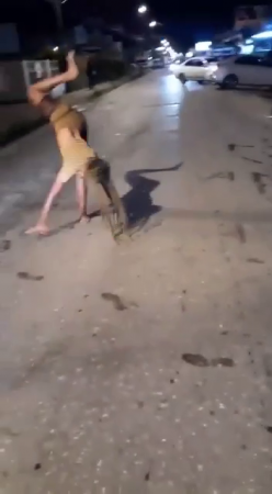 The Idiot Girl Tried To Stand On Her Hands On The Road But Was Swept Away By A Car