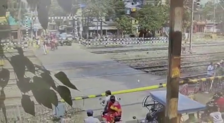 A Pedestrian Cyclist Was Not Fast Enough To Cross A Railroad Crossing