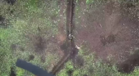 Russian Soldier Throws Grenades Dropped On Him From A Khokhlyat Drone