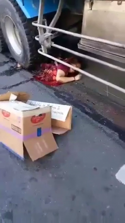 A Woman Completely Crushed By A Truck. Philippines