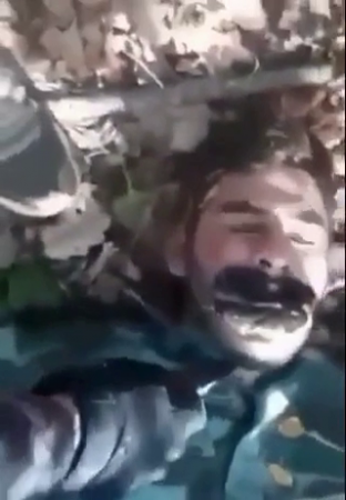 A Captured Enemy Soldier Was Pierced In The Throat With A Knife