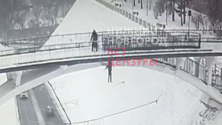 The Woman Jumped Off The Bridge Over The Road. Nizhny Novgorod, Russia