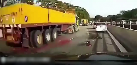 The Moment The Motorcyclist Falls Under The Wheels Of The Truck