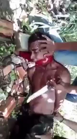 Dude With His Mouth Tied Gets His Head Cut Off For A Long Time