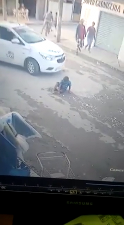 Child Warning! A Car Ran Over A Child Sitting On The Road