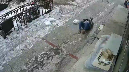 An Ice Block Fell On The Woman's Head. Russia