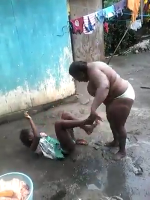 A Half-naked Woman Beats Her Daughter..... Pity The Dog