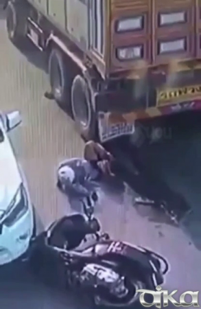 The Truck Drove Over The Legs Of A Motorcyclist Who Fell Under The Wheels
