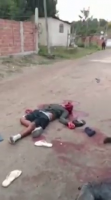 Several Corpses On The Street After A Gang Fight