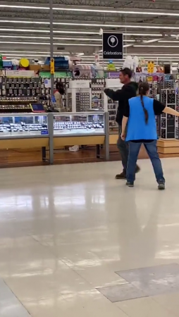 Dude Smashes A Jewelry Display Case With A Hammer.