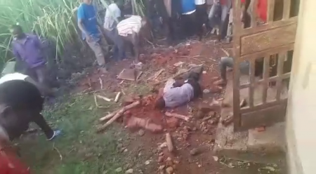 A Crowd Of Villagers Beat A Guilty Man To Death With Stones And Sticks