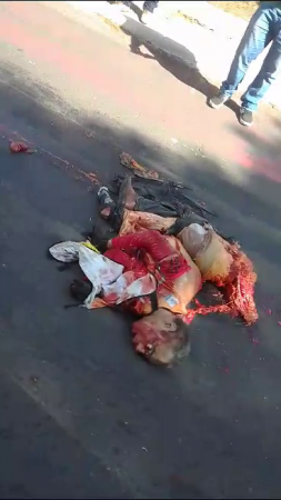 The Internal Organs Of A Crushed Motorcycle Taxi Driver Are Scattered Along The Road