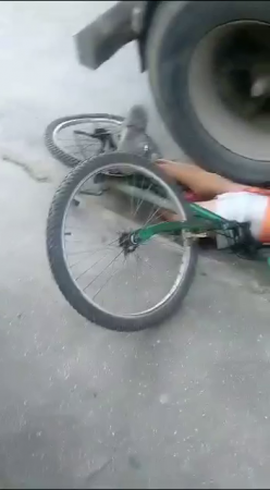 Completely Mutilated Body Of A Cyclist Under The Wheels Of A Truck