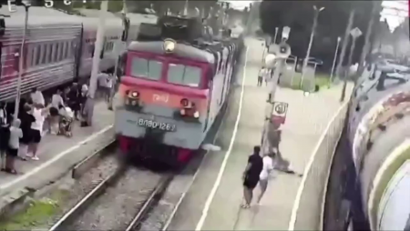 A Man With A Child In His Arms Was Hit By A Train. Russia
