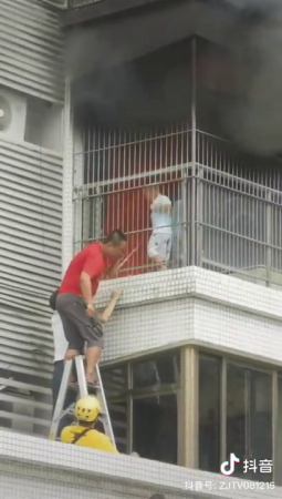 Rescuing A Child Trapped In A Burning Apartment