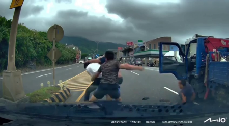 Small Fight On The Road Between Truck Drivers. China