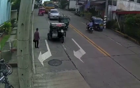 A Man With A Briefcase In His Hands Rushed Under The Truck. Philippines