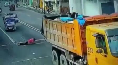 Insane Man Survives After Garbage Truck Runs Over Him