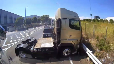 Tractor-trailer Rammed A Motorcyclist In A Road Barrier
