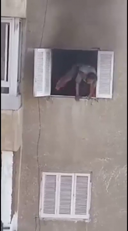 A Man Escaping From The Fire Fell Out Of The Window Of The 4Th Floor